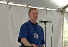 Jim addressing guests at 10-year anniversary celebration in 2006