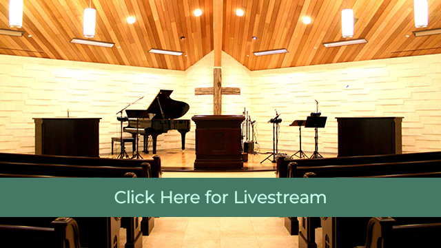 Podium with the cross in the background inside Reverence Bible Church Livestream